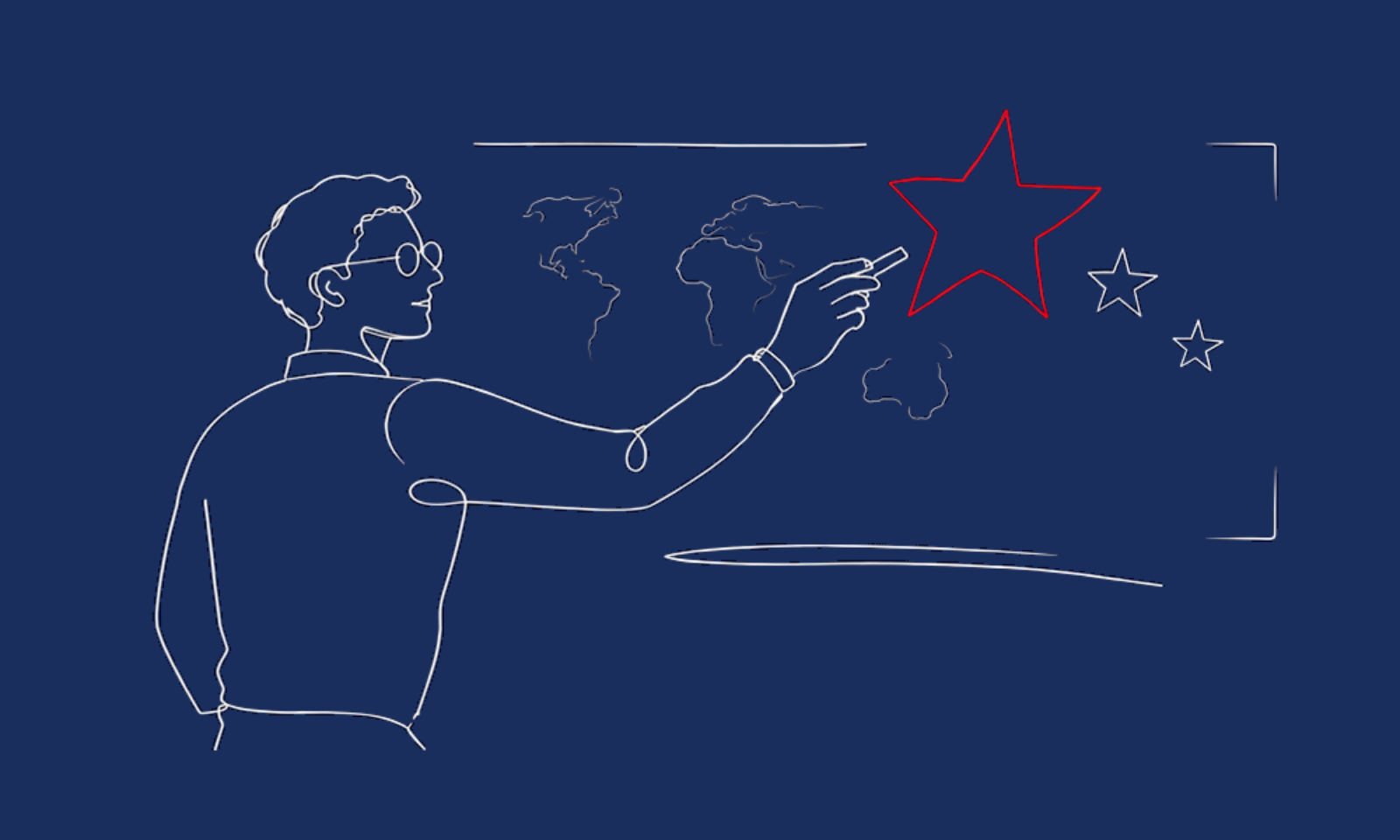 Un enseignant dessine une étoile devant une carte du monde
